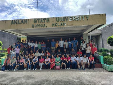 Participants In Front Of Aklan State University’s Main Building Cbsua