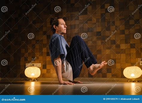 A Man With A Naked Torso Does Yoga In The Gym The Concept Of A Healthy Lifestyle Stock Image