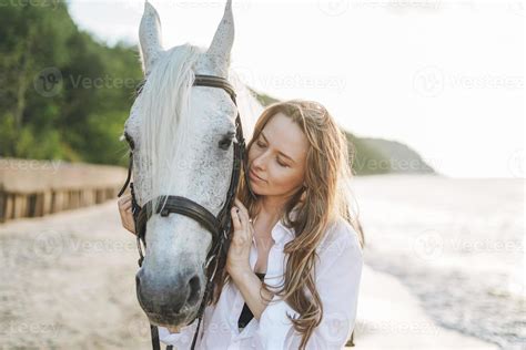 Woman With Horse Stock Photos, Images and Backgrounds for Free Download