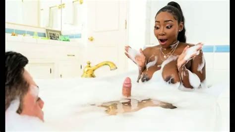 A Mulatto With Huge Tits Fucks With Her Stepson Right In The Bathroom And Cums