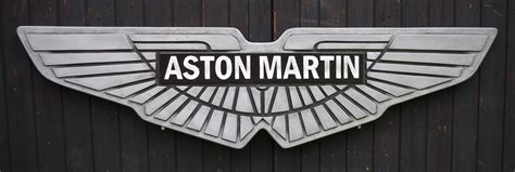 Bonhams Cars : An 'Aston Martin' garage display emblem,