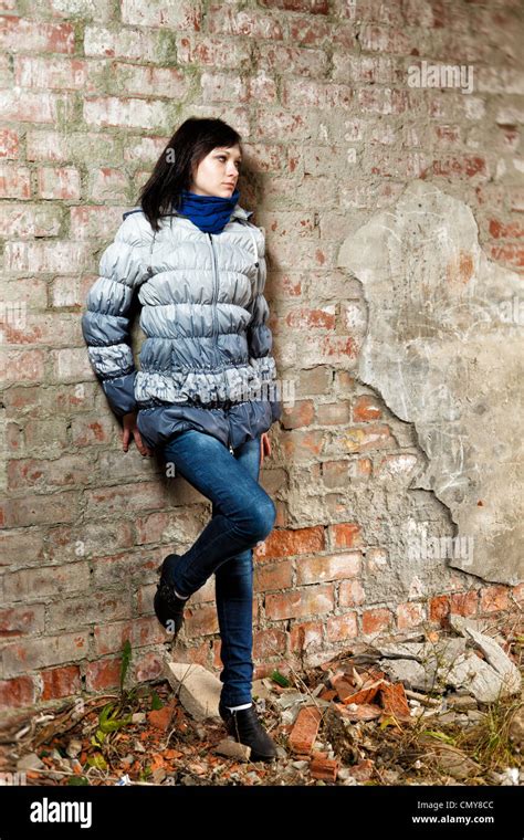 Brunette Girl Posing At Abandoned Ruins Stock Photo Alamy
