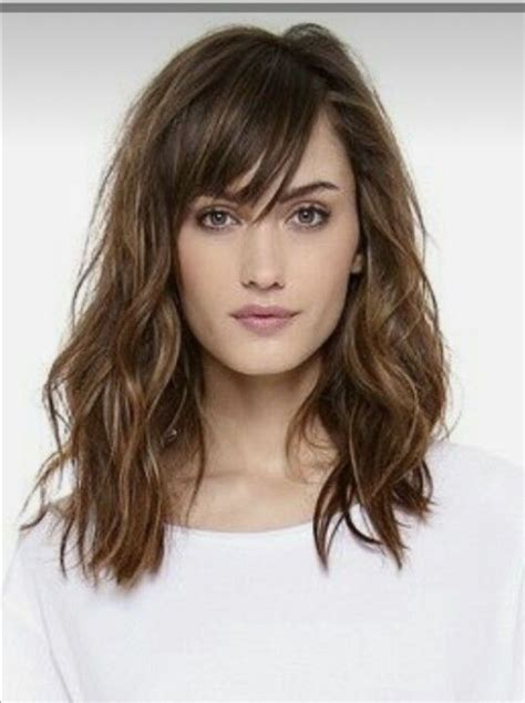 Stylists are recommending mid length layered styles for 2024 1