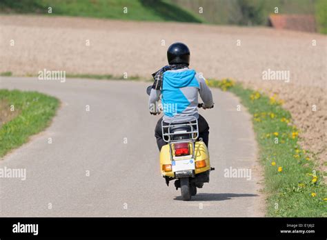 Man Driving Vespa Hi Res Stock Photography And Images Alamy