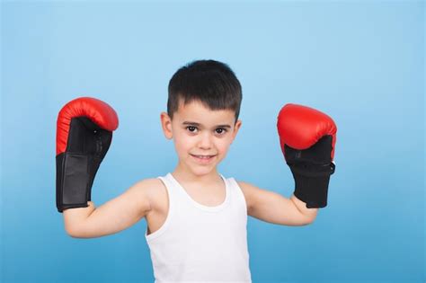 Premium Photo | Boy with boxing gloves