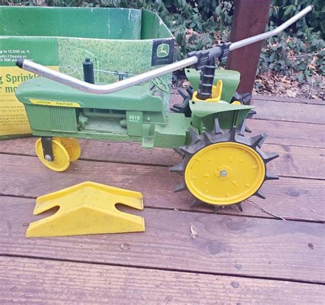 JOHN DEERE TRAVELING SPRINKLER EstateSales Org