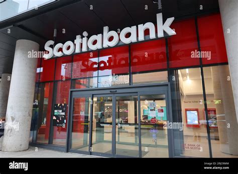 The Scotiabank logo is seen in the sun outside of a bank branch in ...