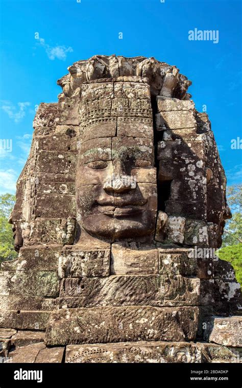 Buddha Face Carved In Stone At The Bayon Temple Angkor Thom Angkor