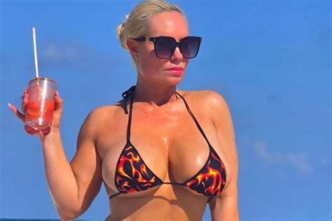 Coco Austin Bares Her Butt Cheeks In Flaming Hot Thong Bikini