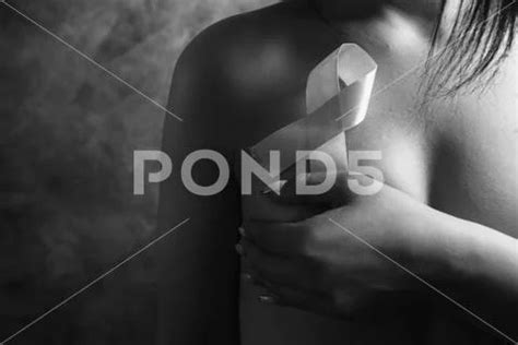 Naked Woman Covered Her Hand Holding A Pink Ribbon Hi Res 160769643