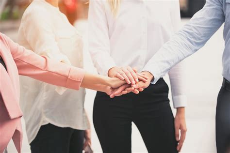 Premium Photo Midsection Of Business People Stacking Hands