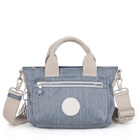 Bolsa de Mão Kipling Miho Mini Blue Jeans Azul Viajante Moderno