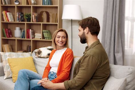 Romantic Couple Talking Sofa Happy Couple Relaxing On Couch At Home Stock Image Image Of