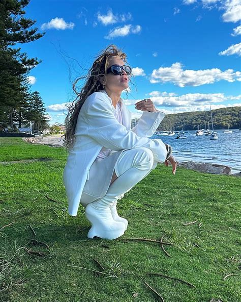 Rita Ora Displays Her Incredible Figure In A Black Bikini And Crochet Dress On The Beach Daily