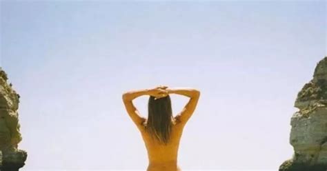 The Naked Traveller Instagram Star S Cheeky Holiday Snaps As She Travels World Posing In The