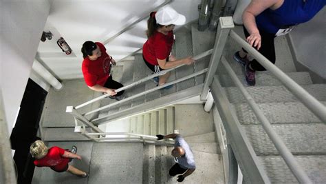 Climbers hike to the top of Carew Tower in Fight for Air Climb
