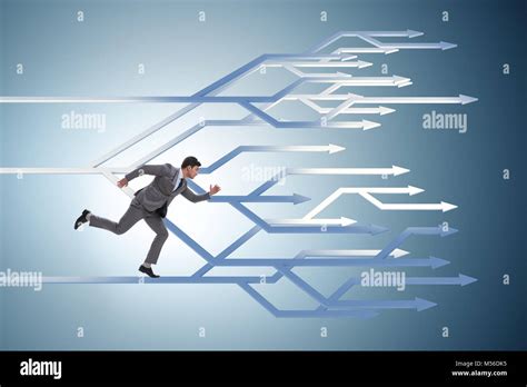 Businessman thinking of different career paths Stock Photo - Alamy