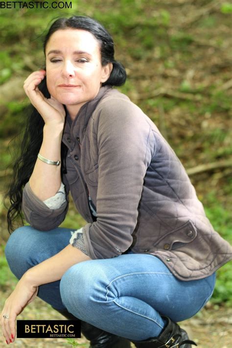 Gorgeous Brunette Babe Poses In Her Clothes Outdoors 15 Photos