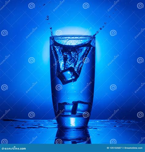 Glass Of Water With Ice Stock Image Image Of Splashing 135132607