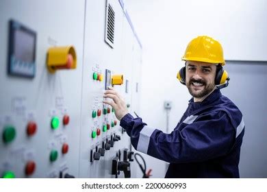 Electrical Engineer Reading Electric Scheme Installations Stock Photo