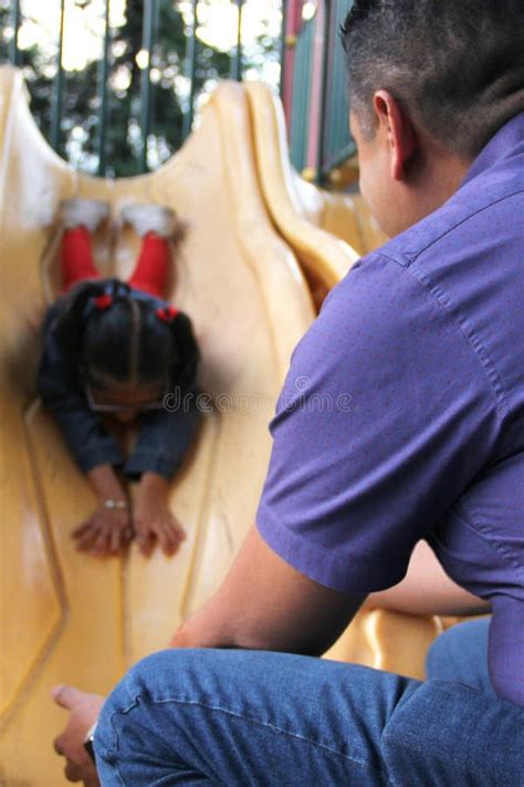 Dad Takes Care Of His 4 Year Old Brunette Latina Daughter In The Park Games So She Doesn T Get