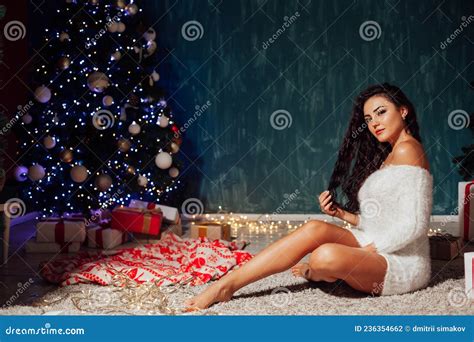 Beautiful Brunette Woman At The Christmas Tree With Gifts New Year Stock Photo Image Of People