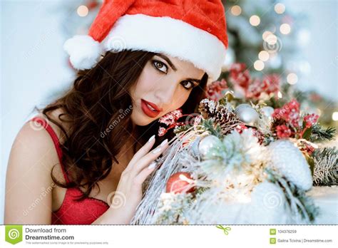 Beautiful Brunette Santa Clause In Elegant Hat And Bra Stock Image
