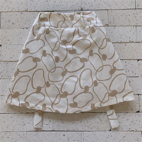 SHORT SAIA CARGO ESTAMPA CAJÚ NUDE Dondoca Moda Feminina