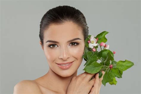 Beautiful Smiling Brunette Woman With Healthy Clear Fresh Skin Closeup Studio Portrait Stock