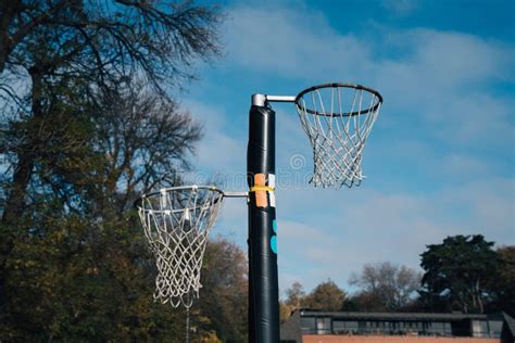 Netball Goal Ring And Net Against A Blue Sky And Clouds At Hagley Park