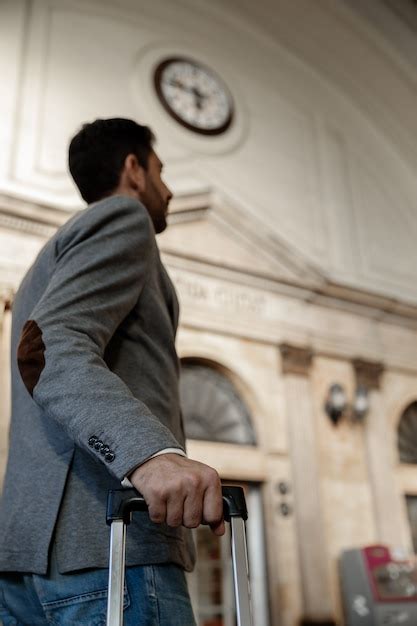 Premium Photo Businessman At The Train Station