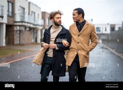 Gay Couple Walking Together Outdoors Stock Photo Alamy