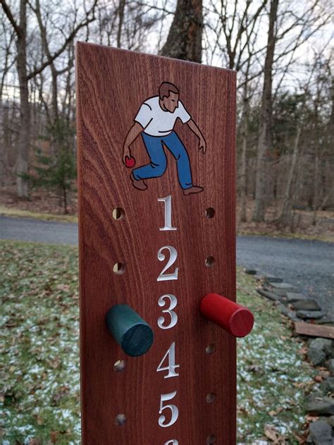 Bocce Scoreboard Mahogany 1 12 With Male Bocce Player Image