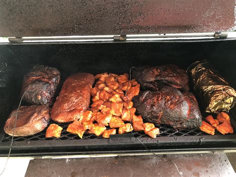 Smoke day part 2, six hours in: pork butts & brisket flat, just added
