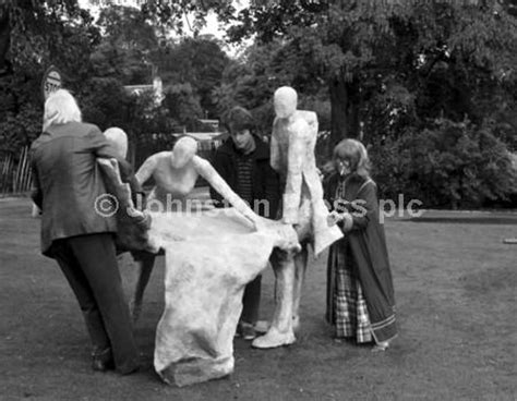 22561540 Sculptor Edith Simon Helps Place Her Life Sized Group