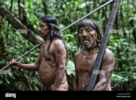 Close Up Of Two Hunter Gatherer Men Amazon Rainforest Ecuador This