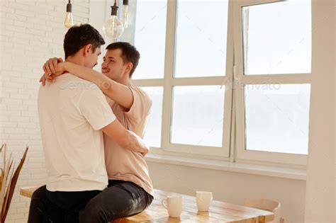 Beautiful Cute Gay Couple Lgbt Couple In Bright Kitchen Stock Photo By Demkat