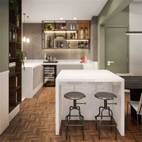 Two Stools Sit At The End Of A Kitchen Island