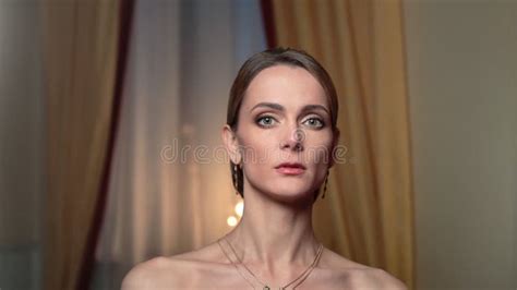 Seductive Naked Beautiful Female Touching Face Neck Shoulder Smooth Skin Posing Looking At