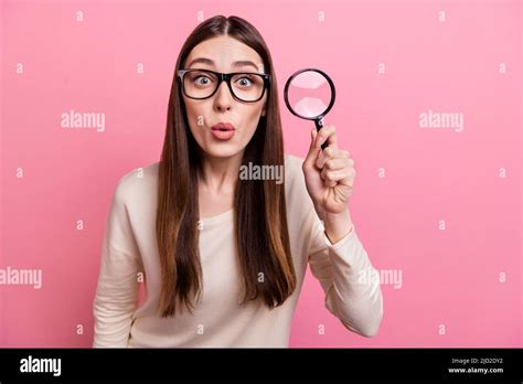 Portrait Of Attractive Cheerful Curious Amazed Funny Girl Holding Loupe