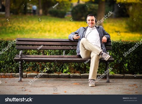 Young Man Sitting On Park Bench Stock Photo 488218501 | Shutterstock