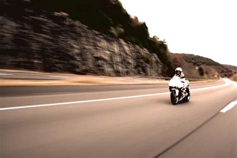 Blonde Woman On A Motorcycle Stock Photo ArenaCreative 9241659