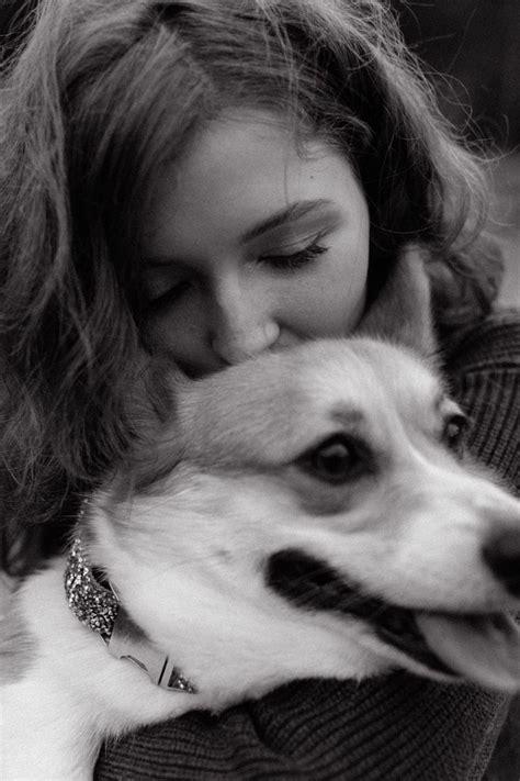 Woman Cuddling with Dog