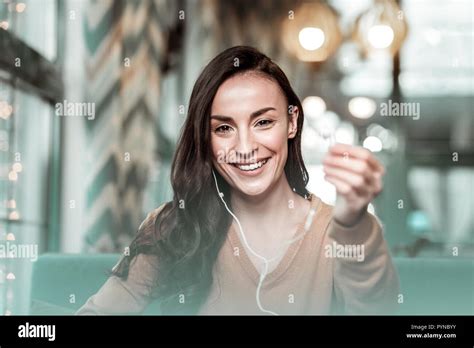 Joyful Brunette Girl Posing On Camera With Pleasure Stock Photo Alamy