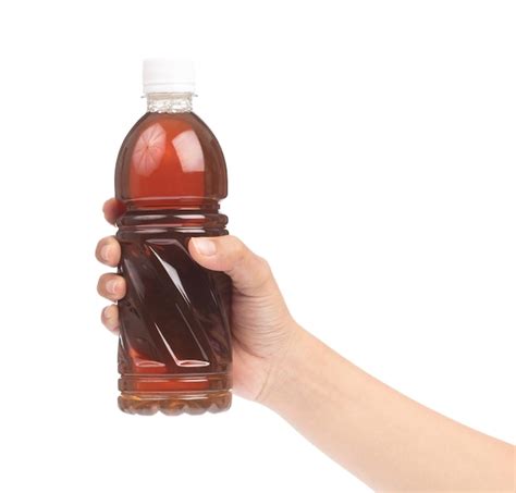 Premium Photo Hand Holding Traditional Roselle Juice In Plastic