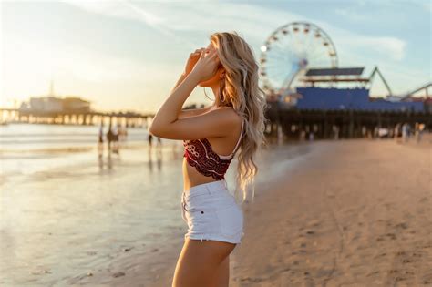 Tanned Women Outdoors Wavy Hair Belly Depth Of Field Blonde Jean Shorts Ass Long Hair