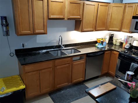 Kitchen cabinet water damage repair - Handyman Chicago