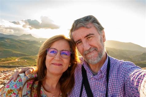 Couple Of Mature Man And Woman Taking A Selfie On A Tourist Trip In