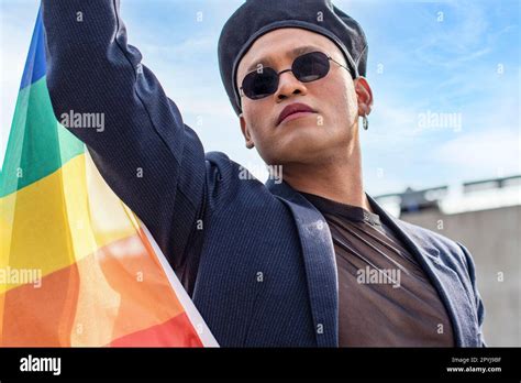Gay Activist Holding A LGBT Rainbow Flag Concept Of Pride Pride Month Stock Photo Alamy