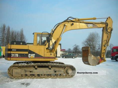 Cat 317 1999 Caterpillar Digger Construction Equipment Photo And Specs